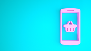 Pink mobile phone icon with shopping basket 